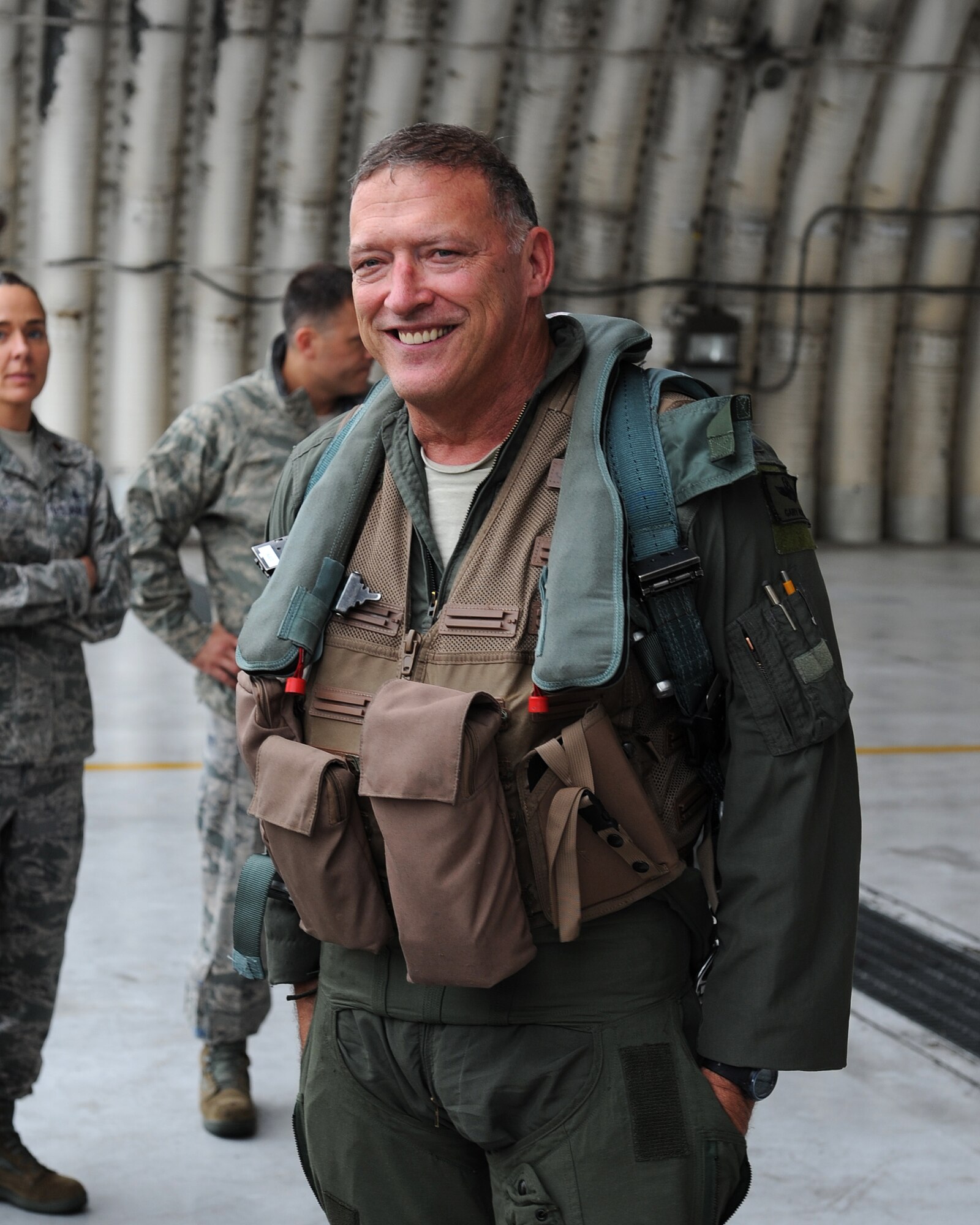 Gen. Gary North, Pacific Air Forces commander, smiles following his final flight at Kunsan Air Base, Republic of Korea, July 17, 2012. North has been stationed at Kunsan twice before including being the 8th Fighter Wing commander from 1999 to 2000. (U.S. Air Force photo/Staff Sgt. Jonathan Fowler)