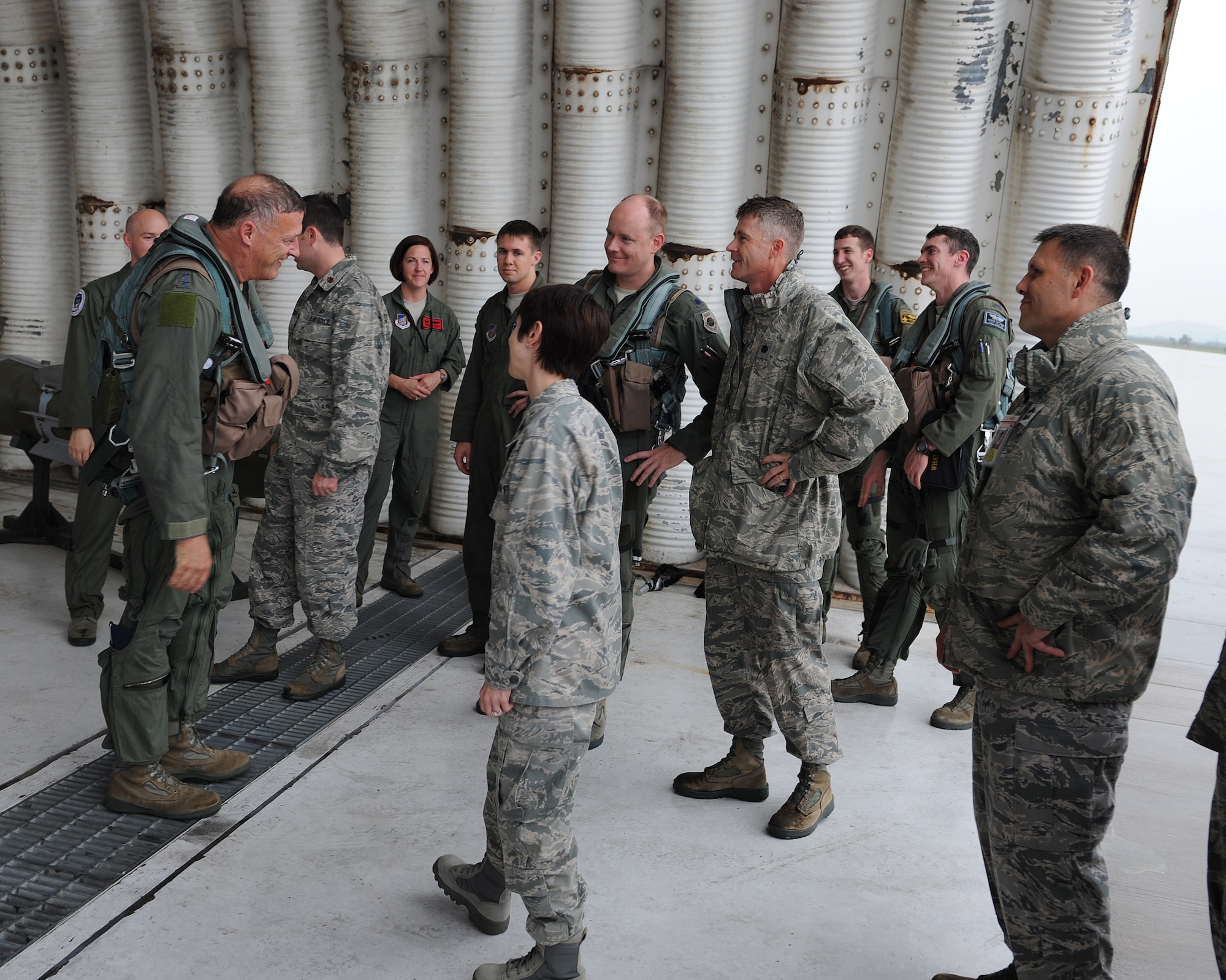 Gen. Gary North, Pacific Air Forces commander, is congratulated by numerous members of the 8th Fighter Wing following his final flight at Kunsan Air Base, Republic of Korea, July 17, 2012. North will be retiring from the U.S. Air Force after 36 years of service. (U.S. Air Force photo/Staff Sgt. Jonathan Fowler)