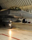 Gen. Gary North, Pacific Air Forces commander, prepares to taxi out of a hangar in an F-16 Fighting Falcon before one of his final flights at Kunsan Air Base, Republic of Korea, July 17, 2012. This flight was one of four flights that the general participated in during his final visit to Kunsan before his upcoming retirement after 36 years of service.  (U.S. Air Force photo/Staff Sgt. Jonathan Fowler)