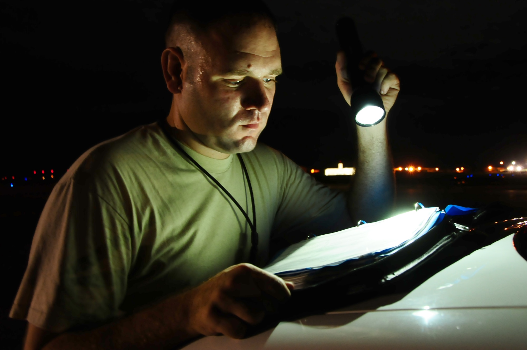 ANDERSEN AIR FORCE BASE, Guam -- Tech. Sgt. Ross Haverstock checks a B-52 Stratofortress aircraft forms here July 31. The 36th EAMXS Airmen make sure the B-52 is ready for the flight in support of the Rim of the Pacific Exercise. (U.S. Air Force photo by Airman 1st Class Marianique Santos/Released)