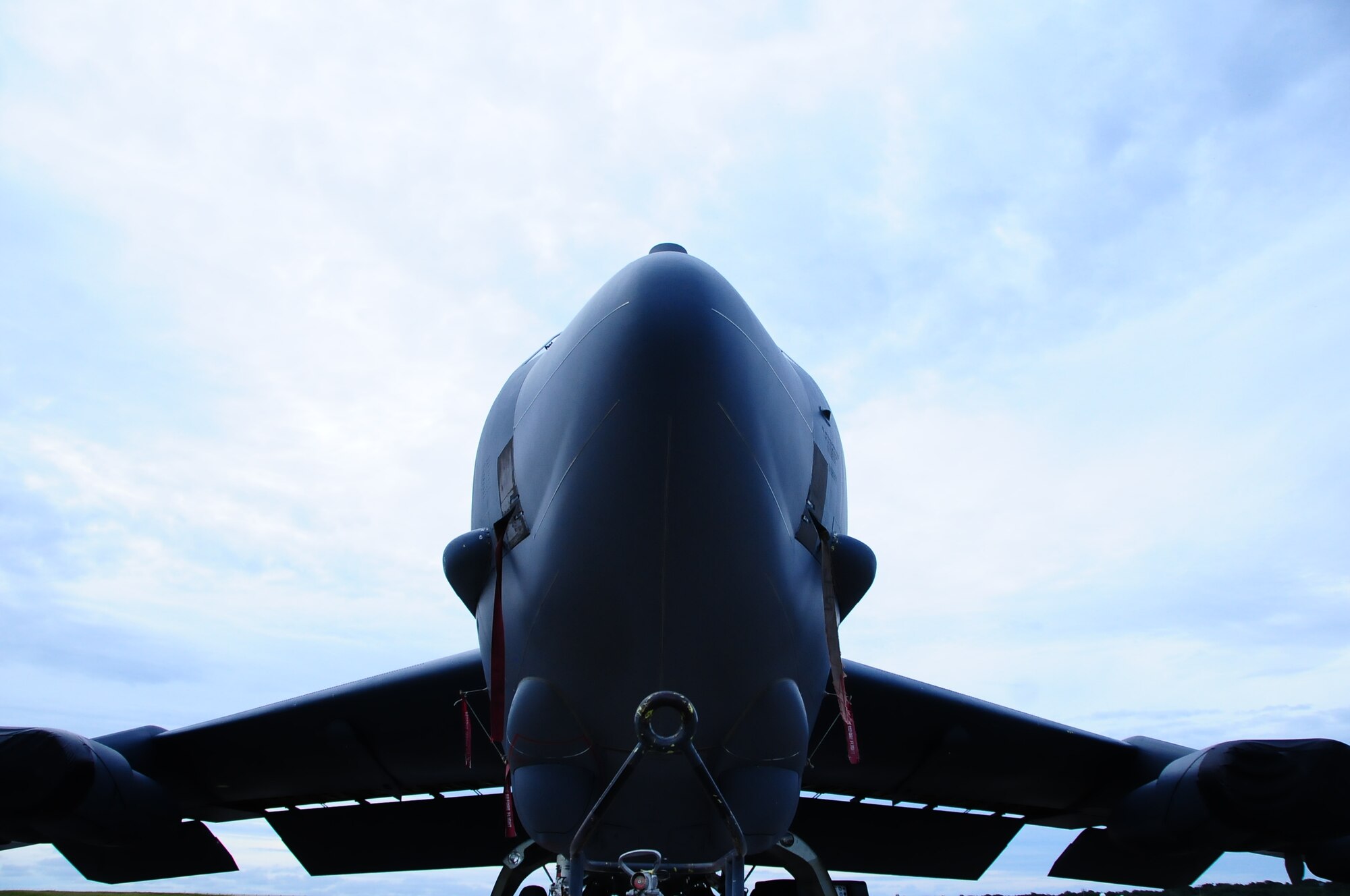 ANDERSEN AIR FORCE BASE, Guam -- A B-52 Stratofortress is parked on the Andersen airfield for pre-flight inspection here July 31. The 36th EAMXS Airmen make sure the B-52 is ready for the flight in support of the Rim of the Pacific Exercise. (U.S. Air Force photo by Airman 1st Class Marianique Santos/Released)