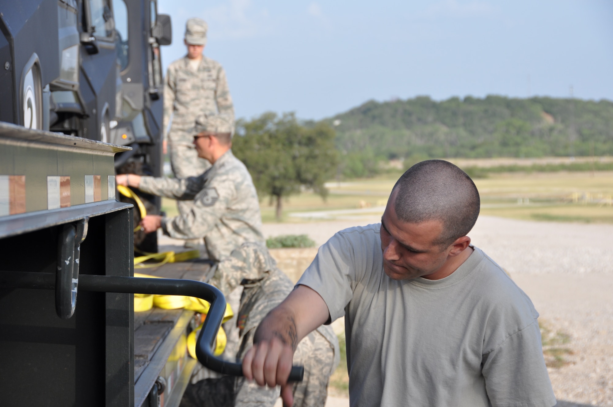 Staff Sgt. Christopher Cowley, 301st Logistic Readiness Squadron, prepares to deploy the off-road vehicles used for the land navigation training at Fort Wolters Army National Guard Facility, Monday, July 23. (U.S. Air Force photo/SrA Jeremy Roman)