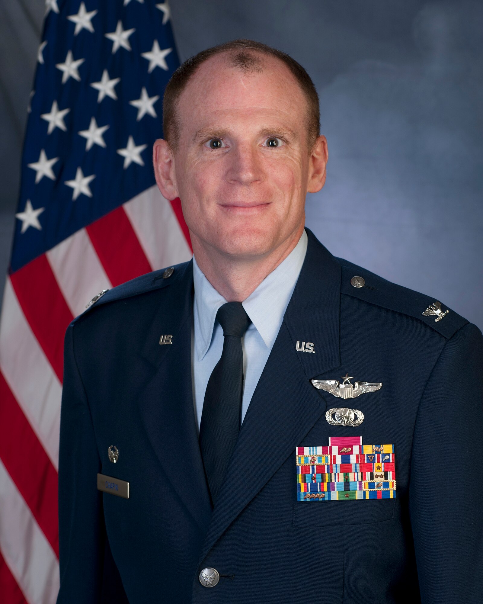 Colonel Martin A. Chapin is Commander, 621st Contingency Response Wing, headquartered at Joint Base McGuire-Dix-Lakehurst, N.J. with additional forces stationed at Travis Air Force Base, Calif. and at various Army and Marine Corps installations worldwide. He commands the Air Force's only contingency response wing. The wing deploys teams of versatile, mobility Airmen disciplined to solve problems in complex environments. Past operations include mobility planning for air support over Libya; distribution of humanitarian aid following Haiti's devastating earthquake; and multiple building partner capacity engagements in Africa and Central and South America. The wing's lean force of 1500 contingency response and mobility advisory Airmen mobilize the fight, provide relief, and advance the peace. They are Air Mobility Command's 9-1-1 force.

