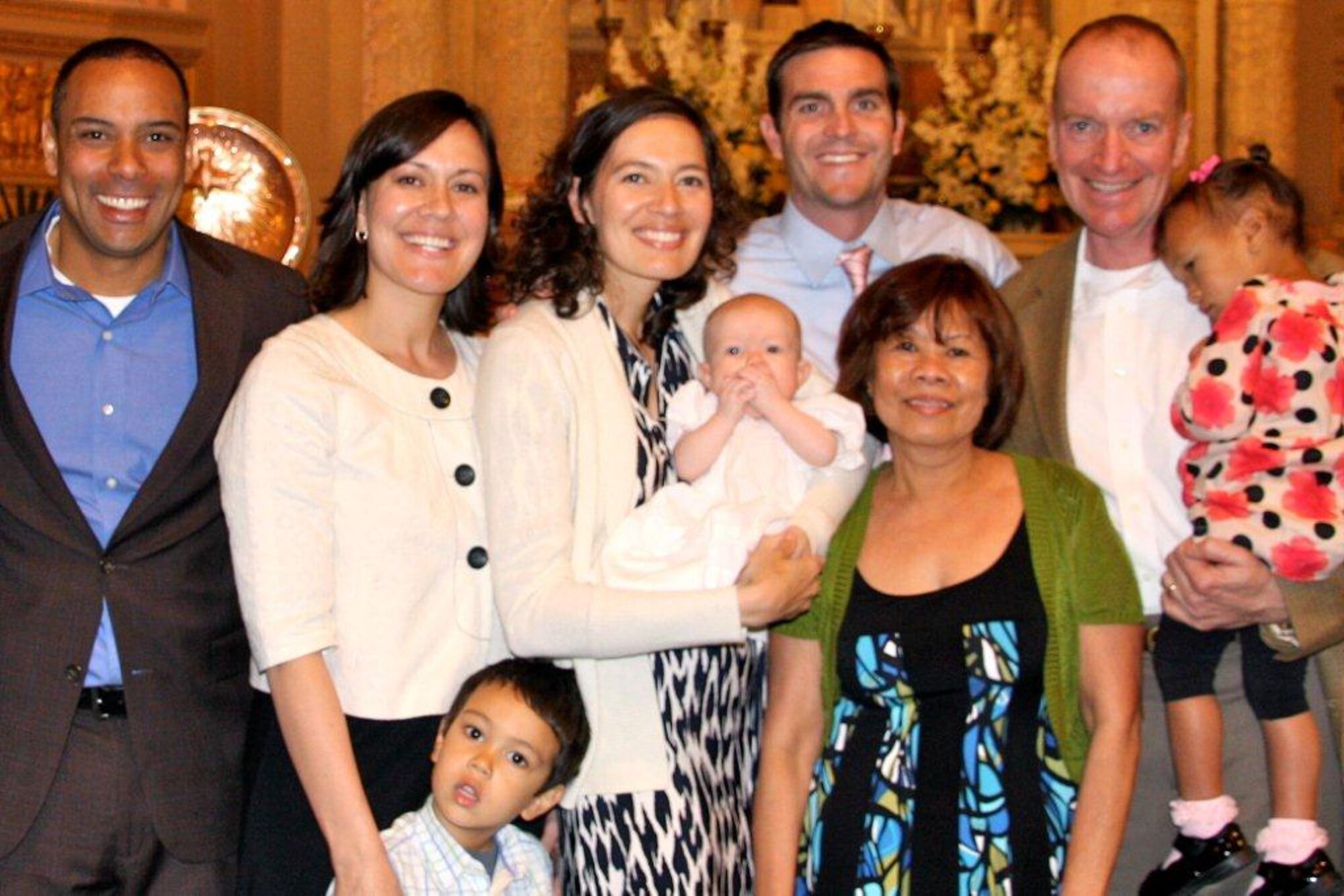 Col. David Lynch, 341st Security Forces Group commander, poses for a group photo with his wife, and their two daughters with their families.  Pictured from left to right are: Scott, Jeannie, and Maxwell Simpson, 5 (front); Christine, Taylor Grace, 8 months, and Scott Leber; Leah, his wife (front); Lynch and Mila Simpson, 2.  (U.S. Air Force Courtesy Photo)