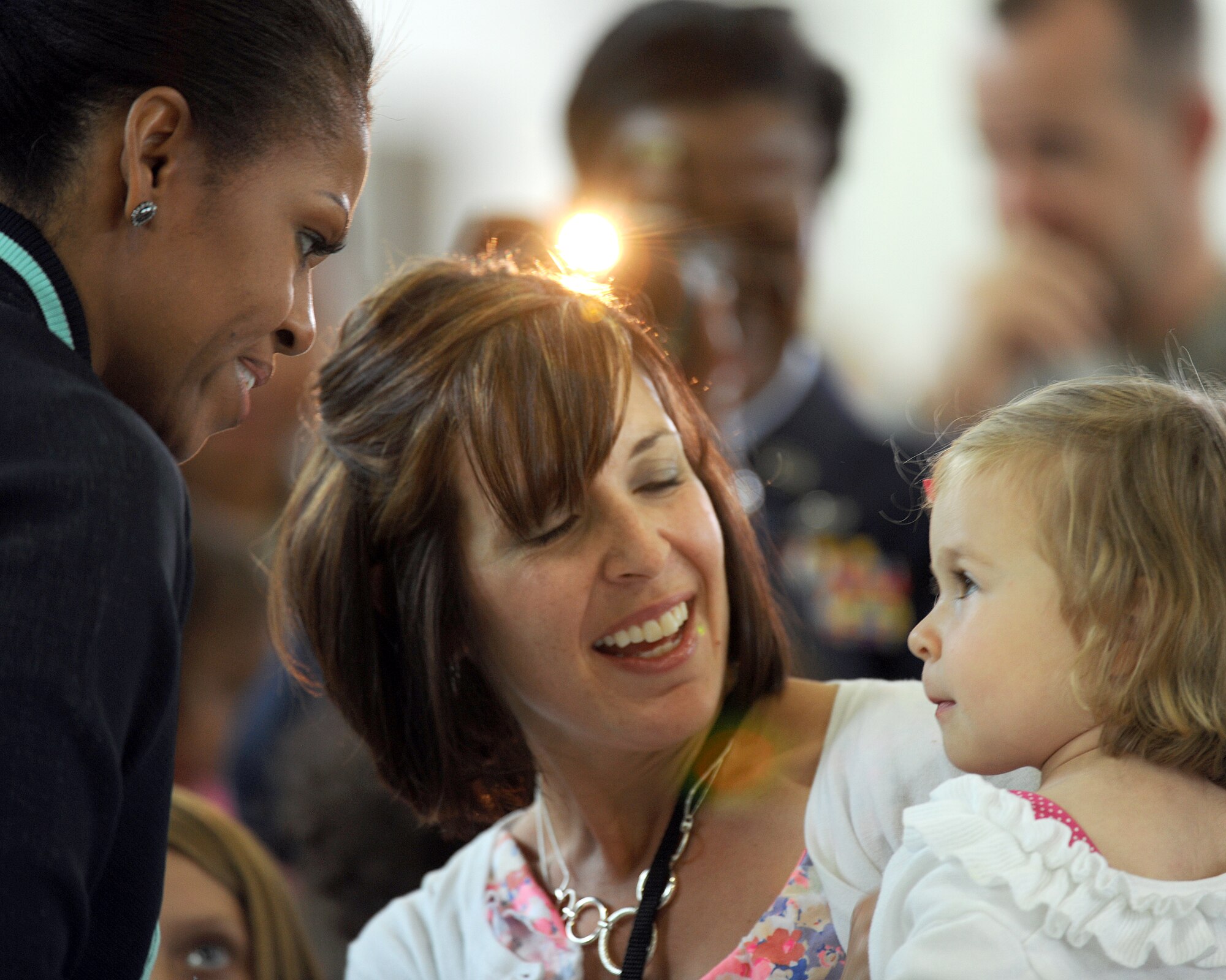 First lady Michelle Obama greets U.S. military families at Royal Air Force Mildenhall, England, July 29, 2012. Obama stopped at the base as part of the “Joining Forces” initiative. (U.S. Air Force photo/Master Sgt. Brian M. Boisvert)