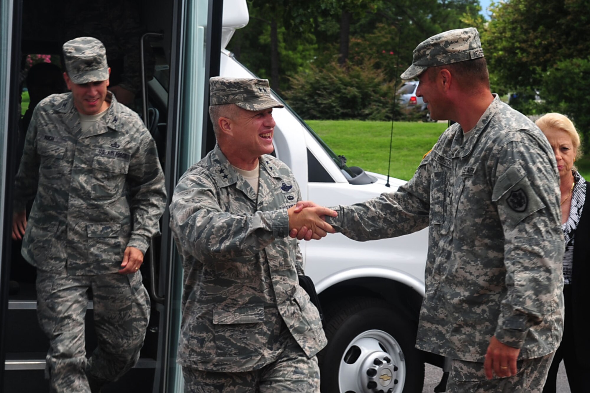 U.S. Air Force Maj. Gen. Lawrence Wells, 9th Air Force commander, greets U.S. Army Col. Thomas Wetherington, 733rd Mission Support Group commander, during a tour at Fort Eustis Va., Aug. 1, 2012. Wells visited Joint Base Langley-Eustis to evaluate the well-being of the personnel. (U.S. Air Force photo by Staff Sgt. Ashley Hawkins/Released)