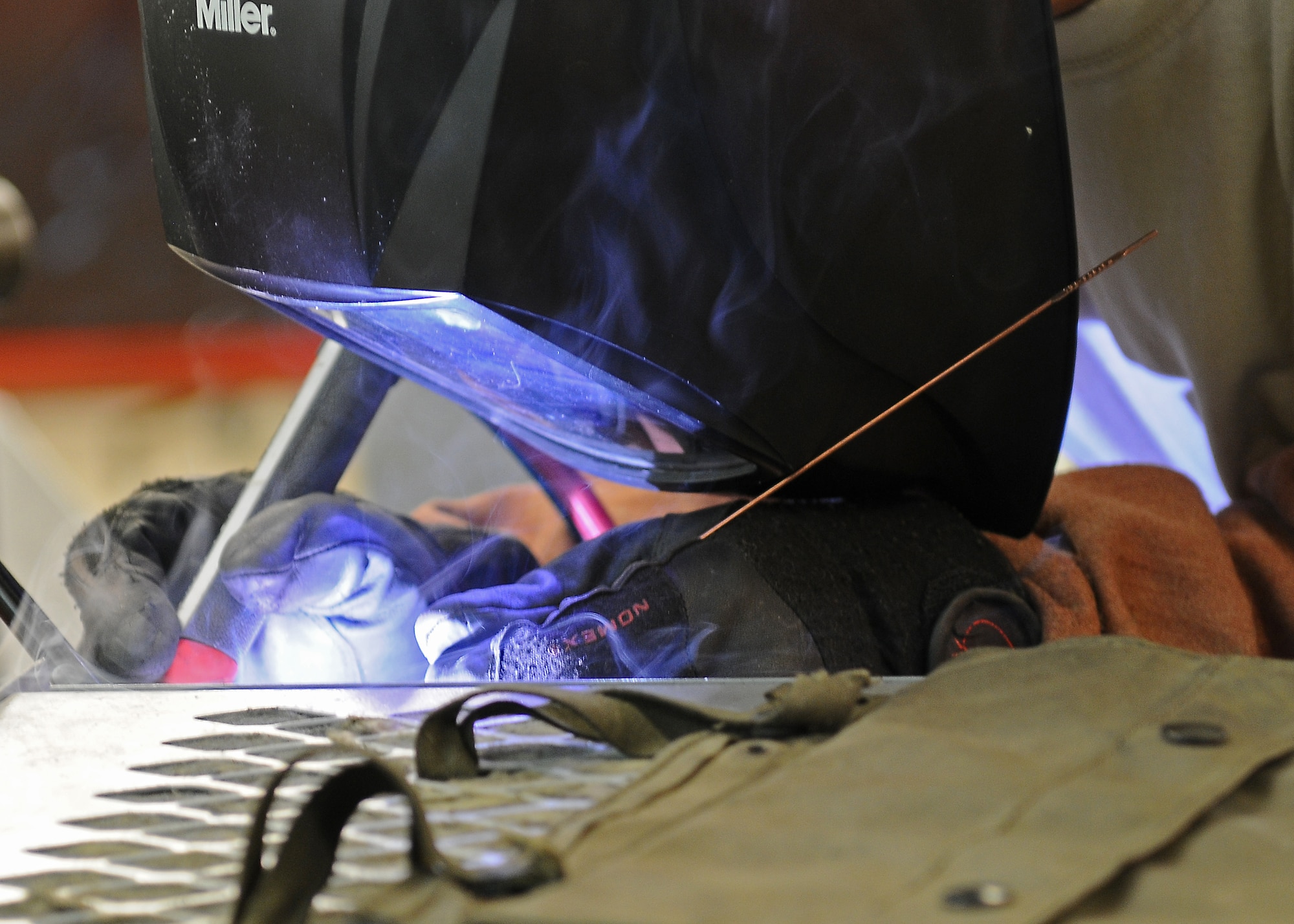 Tech. Sgt. Jesse Swiderek, 31st Maintenance Squadron aircraft metals technology craftsmen, welds a joing on a ground equipment panel July 31, at Aviano Air base, Italy. Swiderek proposed a workcenter change to the Innovative Development through Employee Awareness program regarding the welding of support brackets in aircraft fuel tanks, and received a $10,000 reward when his proposal was accepted.(U.S. Air Force photo/Staff Sgt. Ryan Whitney)