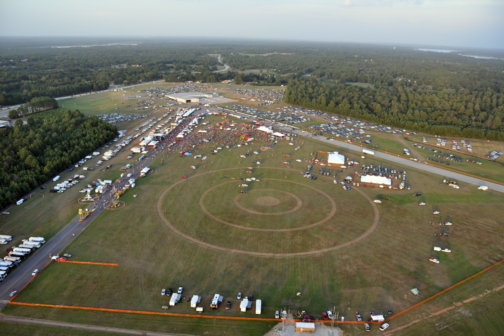 Thousands of spectators start gathering at the 35th Annual Great Texas Balloon Race 2012, at the East Texas Regional Airport in Longview, Texas, July 28, 2012. For the first time in the 35-year history of the event, the U.S. National Championships were held in conjunction with the annual event. (U.S. Air Force photo by Master Sgt. Jeff Walston)
