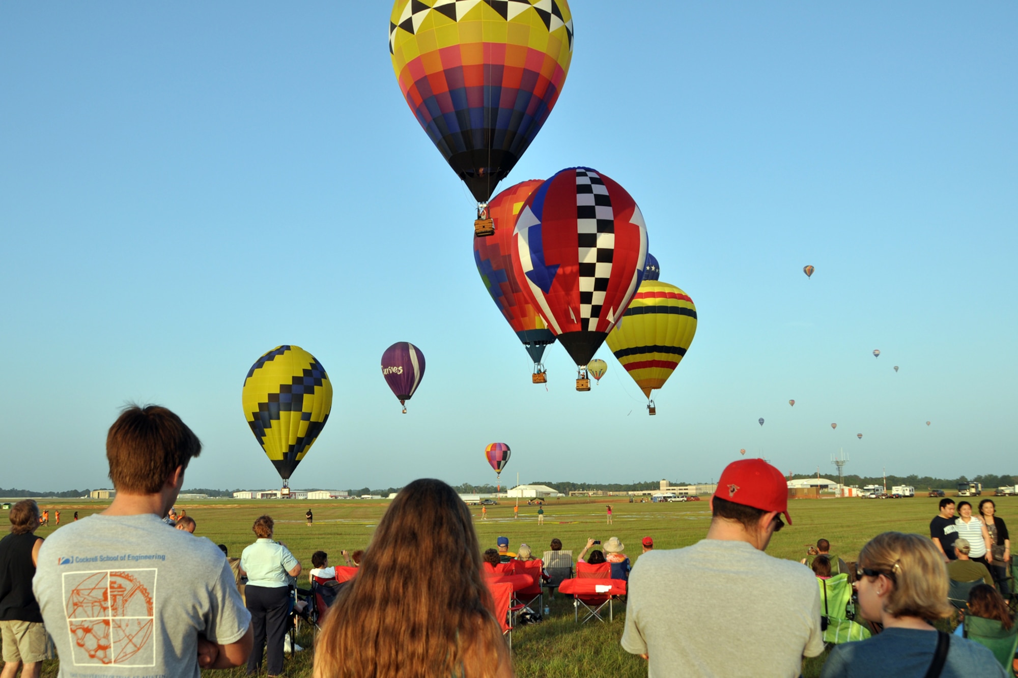 Spectators at the Great Texas Balloon Race 2012, watch the Ring Toss Competition and the other Navigational Tasks for both US Nationals and the GTBR competitors at the East Texas Regional Airport in Longview, Texas, July 28, 2012. For the first time in the 35-year history of the event, the U.S. National Championships were held in conjunction with the annual event. (U.S. Air Force photo by Master Sgt. Jeff Walston)    