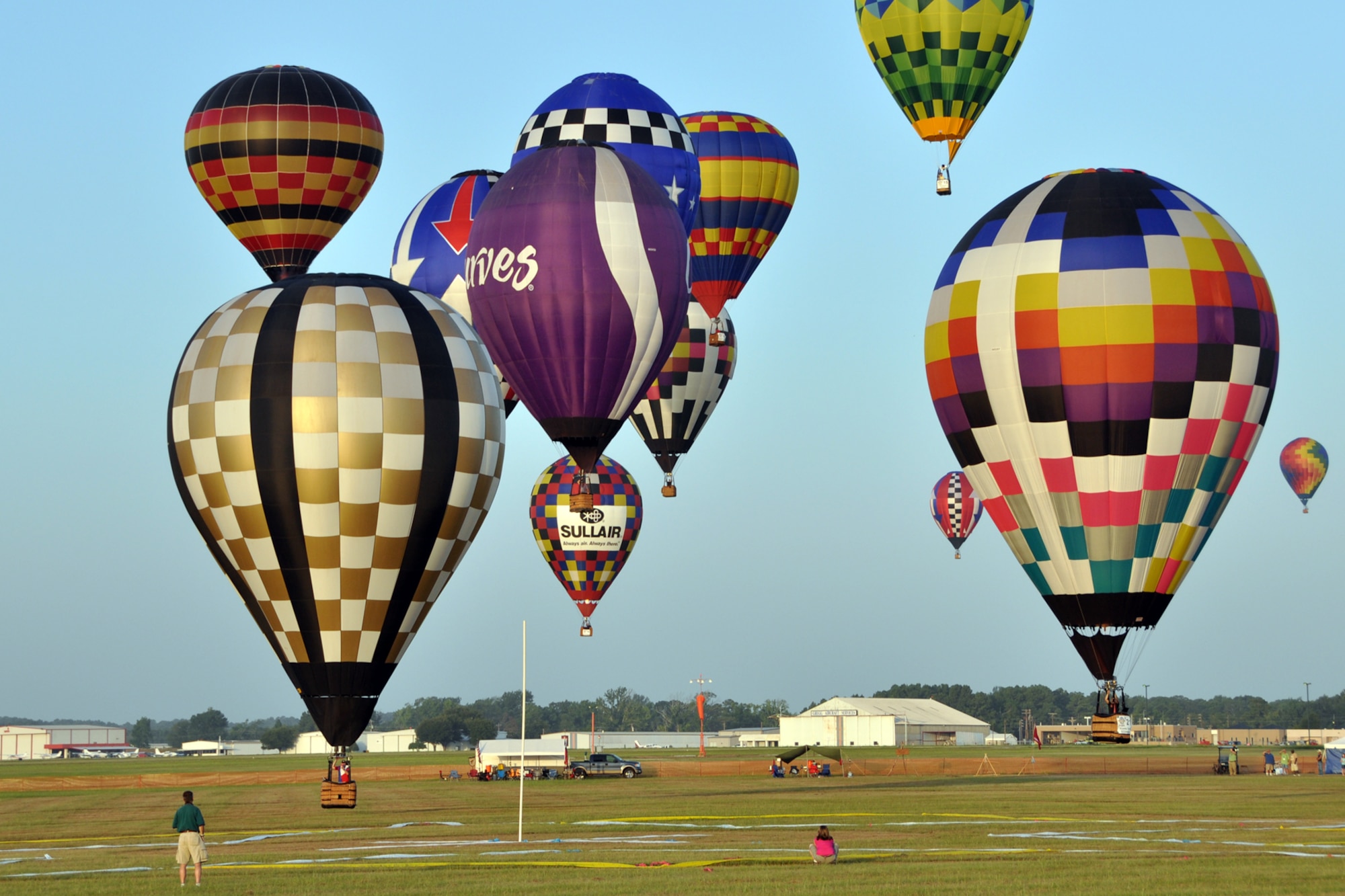 A number of hot air balloons move toward their target areas during the Great Texas Balloon Race 2012, at the East Texas Regional Airport in Longview, Texas, July 28, 2012. For the first time in the 35-year history of the event, the U.S. National Championships were held in conjunction with the annual event. (U.S. Air Force photo by Master Sgt. Jeff Walston)    