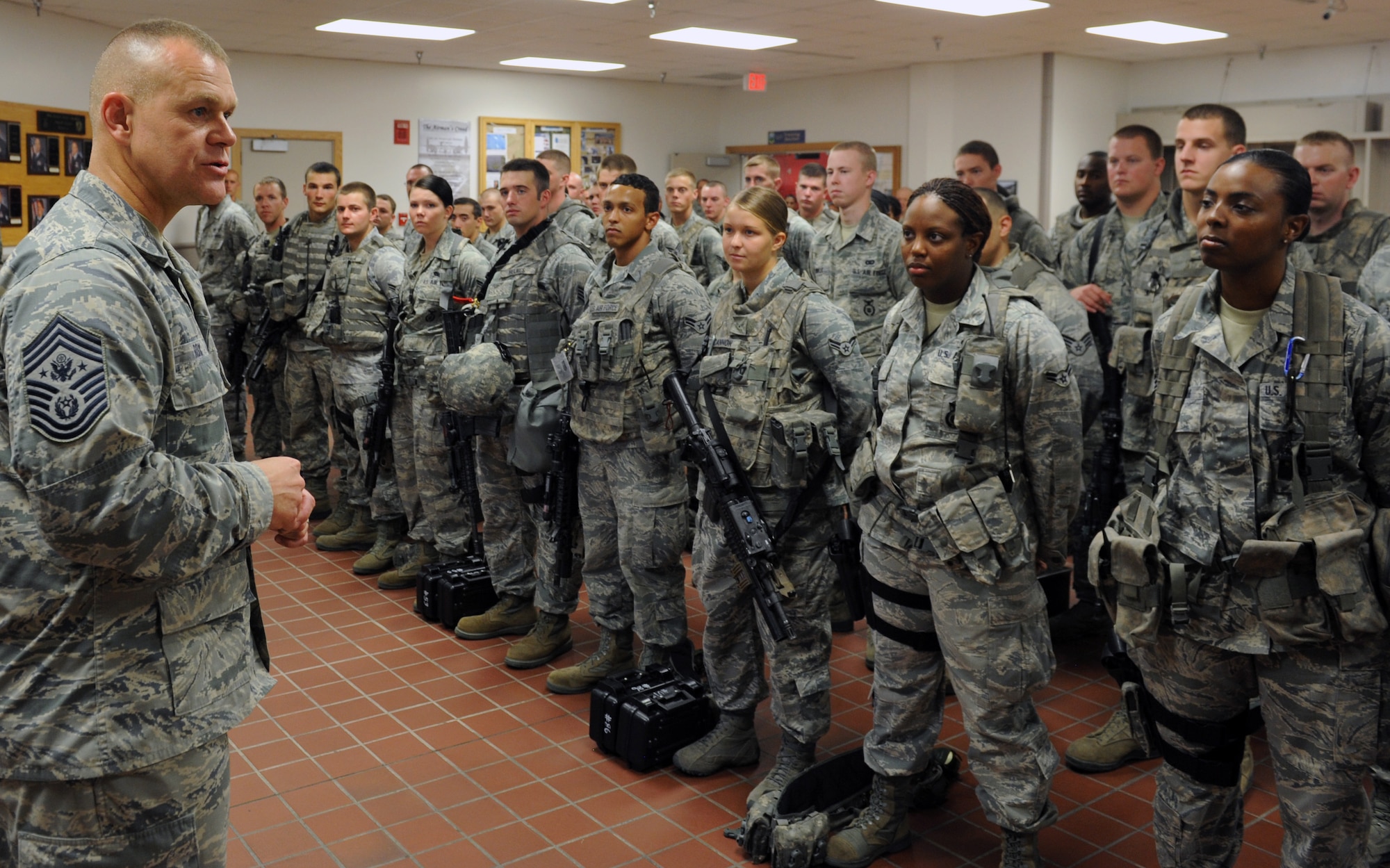 Chief Master Sgt. of the Air Force James Roy addresses members of the 509th Security Forces Squadron. Roy visited Whiteman AFB July 25 and 26. (U.S. Air Force photo/Airman 1st Class Bryan Crane)