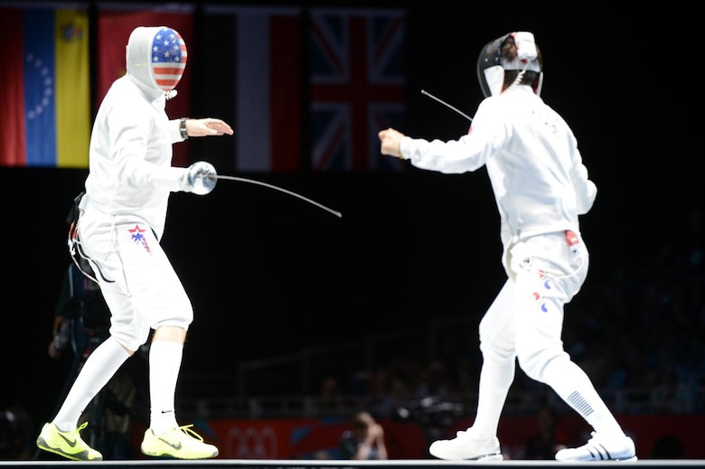 U.S. Air Force fencer Capt. Seth Kelsey loses the Olympic men's epee individual bronze-medal match, 12-11, to Korea's Jinsun Jung in sudden-death overtime on Aug. 1 at the ExCel South Arena in London. (U.S. Army photo/Tim Hipps)