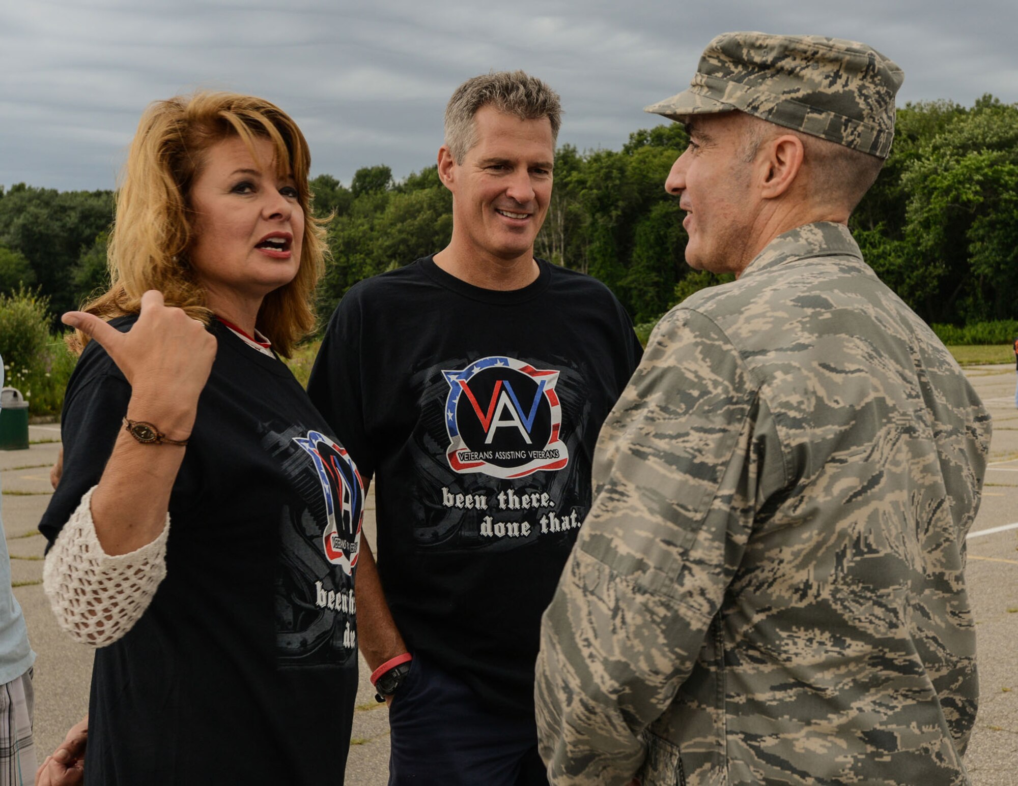HANSCOM AIR FORCE BASE, Mass. – Col. Lester A. Weilacher (right), 66th Air Base Group commander, speaks to Sen. Scott Brown and his wife, Gail Huff, before the Veterans Assisting Veterans Motorcycle Run  July 28. The event, which started at Hanscom and proceeded to Lowell, Mass., benefitted American War Widows of Iraq and Afghanistan, American Veterans with Brain Injuries and Massachusetts Fallen Heroes Memorial. (U.S. Air Force photo by Walter Santos)