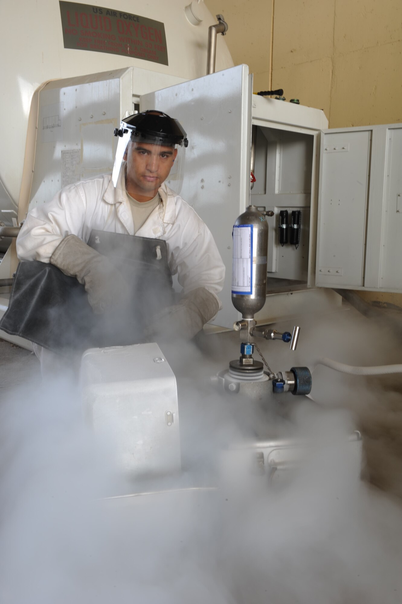 Staff Sgt. Alvaro Usueta, 39th Logistics Readiness Squadron hydrant supervisor, performs an oxygen test Aug. 2, 2012, at Incirlik Air Base, Turkey. The tests are conducted every 90 days to ensure the oxygen in the tanks is suitable for use. (U.S. Air Force photo by Senior Airman Anthony Sanchelli/Released)
