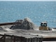 Sand and water are pumped through a basket during beachfill operations on Long Beach Island. 