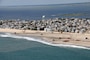 An aerial photograph captures contractors completing the Brant Beach storm damage reduction project in 2012. The beachfill work is designed to reduce storm damages to infrastructure. 