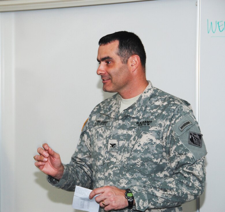 Colonel Bryan P. Truesdell, Japan District Commander, praises students for their efforts during the 2012 West Point Bridge Design Contest at Zama American High School. (Official Japan Engineer District photo by T.W. Lyman)