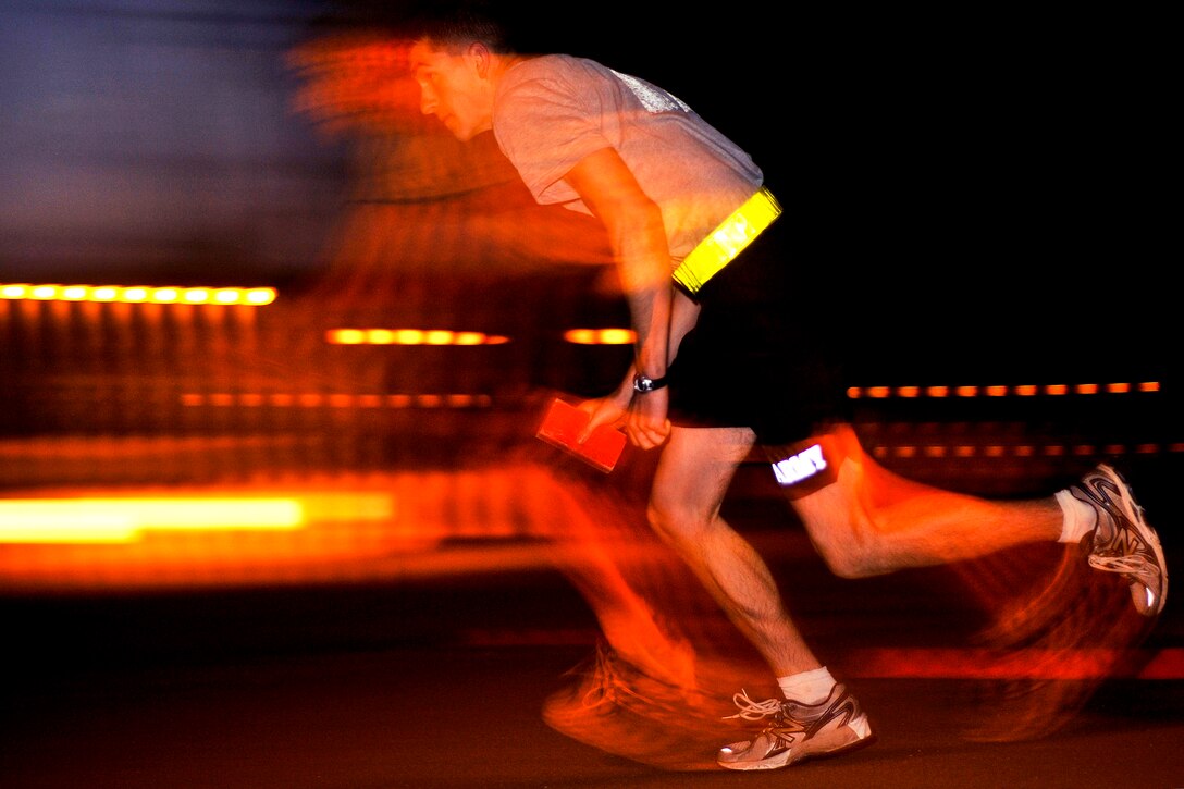 U.S. Army 1st Lt. John Tidwell performs a 60-yard shuttle run, part of the Army's physical readiness test, during the U.S. Army Europe's Best Junior Officer Competition in Grafenwoehr, Germany, July 27, 2012. Tidwell is assigned to the 72nd Expeditionary Signal Battalion. The competition gives company grade officers the chance to compete in multiple tasks and be named "best officer" for U.S. Army Europe.