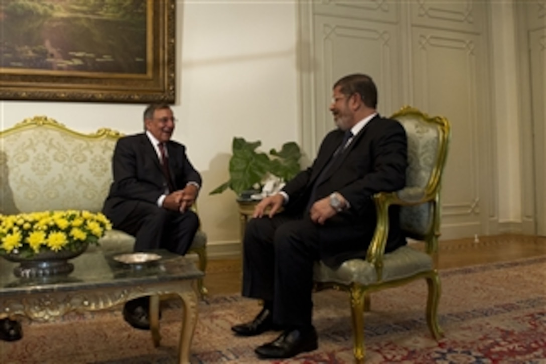 Secretary of Defense Leon E. Panetta, left, meets with Egyptian President Muhammad Mursi in Cairo, Egypt, July 31, 2012.  Panetta is on a 5-day trip to the region, stopping in Tunisia, Egypt, Israel and Jordan to meet with senior leaders and counterparts