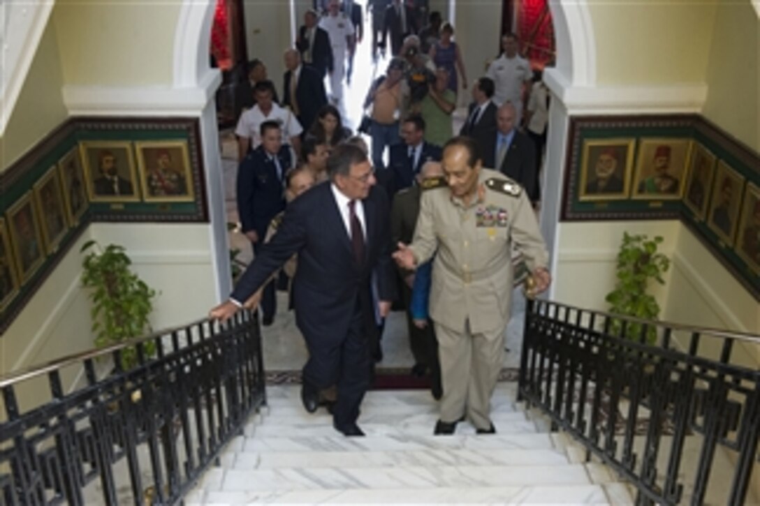 Secretary of Defense Leon E. Panetta walks with Egyptian Field Marshall Mohamed Hussein Tantawi in Cairo, Egypt, on July 31, 2012.  Panetta is on a 5-day trip to the region, stopping in Tunisia, Egypt, Israel and Jordan to meet with senior leaders and counterparts.  