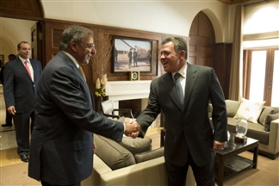 Secretary of Defense Leon E. Panetta, left, greets Jordanian King Abdullah II ibn Al Hussein, in Amman, Jordan, on Aug. 2, 2012.  Panetta is on a 5-day trip to the region, stopping in Tunisia, Egypt, Israel and Jordan to meet with senior leaders and counterparts.  