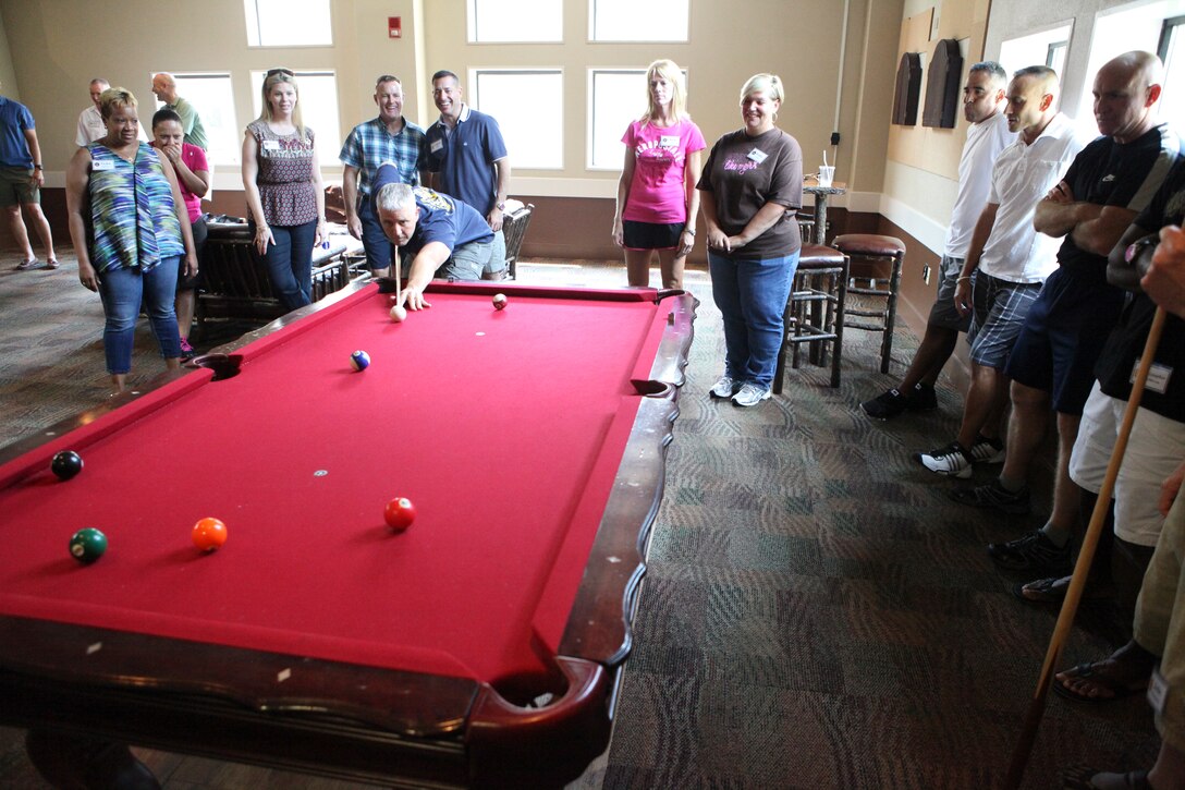 Attendees of the 2012 Sergeant Major of the Marine Corps Symposium compete in a team building event at the Bolger Conference Center, Potomac, Md., Aug 2, 2012.
