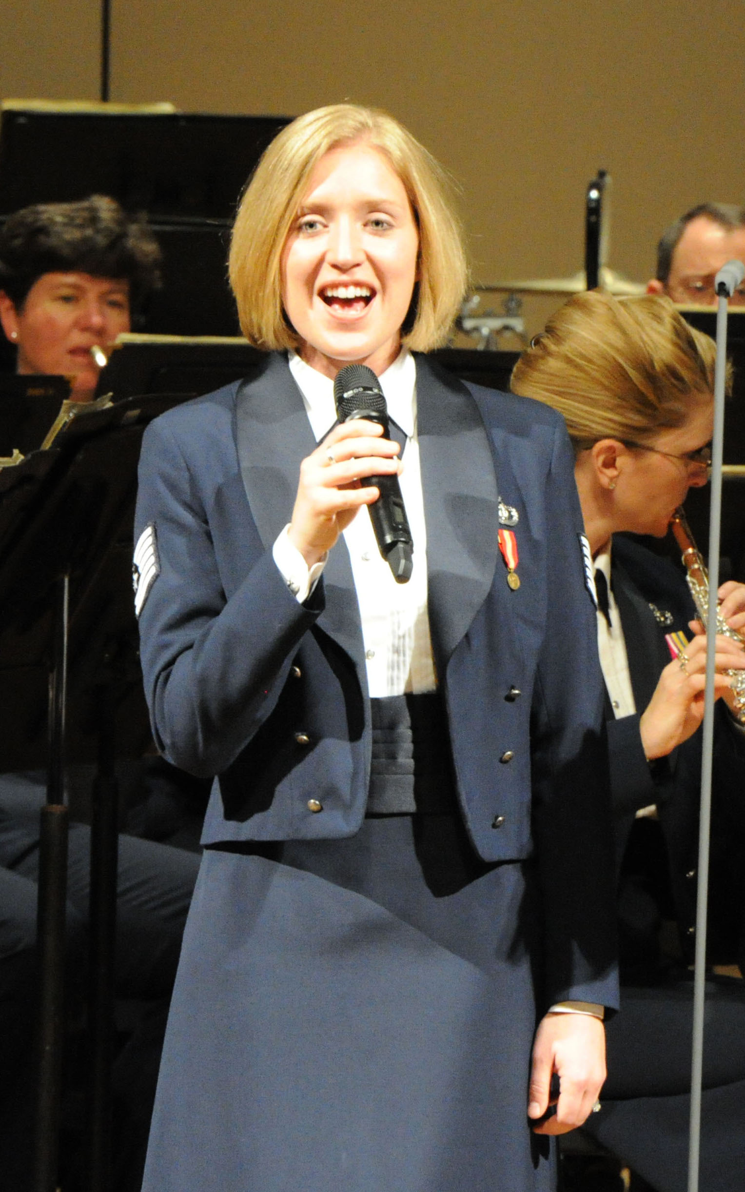 Tech. Sgt. Mandi Harper performs with The U.S. Air Force Band Singing Sergeants on Oct. 18 2011 at the Cheyenne Civic Center, Cheyenne, Wy., on the USAF Band's 2011 Fall Tour. (U.S. Air Force photo by Airman 1st Class Tabitha N. Haynes)
