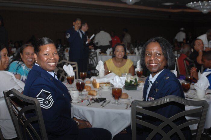 Master Sgt. Veronica Reynolds and Lt. Col. Bertha Jackson, Joint Base McGuire-Dix-Lakehurst, N.J. participate in a youth lunch Aug. 2, 2012 in downtown Las Vegas, Nev. during the 41st Annual Tuskegee Airmen, Inc. National Convention. The Tuskegee Airmen were the young men who enlisted in the U.S. Army Air Corps to become America's first black military Airmen. (U.S. Air Force photo by Senior Airman Jack Sanders)
