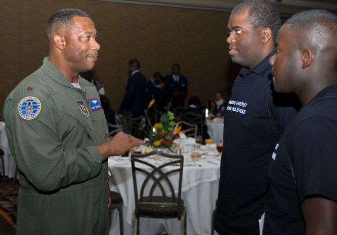 Maj. Terry Troutman, Air Force Reserve Command,  speaks with  young men at a youth lunch about how the Air Force could fit into their future Aug. 2, 2012 in downtown Las Vegas, Nev. during the 41st Annual Tuskegee Airmen, Inc. National Convention.The youth lunch's purpose was put on to help today's youth remember their past, and allowed leaders to provide mentorship to the youth. (U.S. Air Force photo by Senior Airman Jack Sanders)
