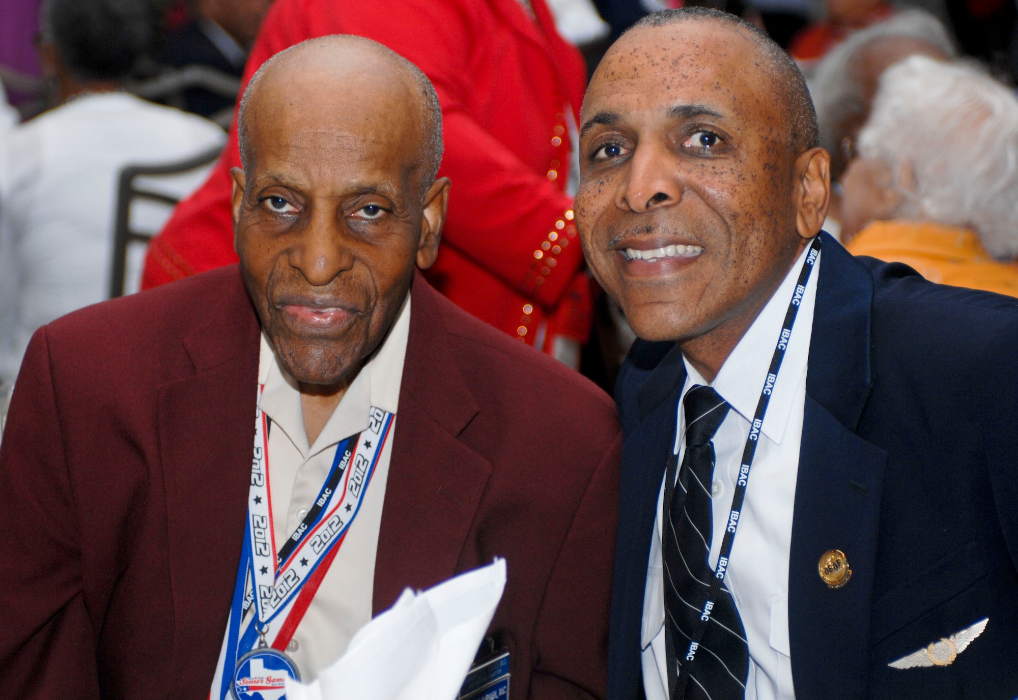 Granville Coggs (left) and Tandy Coggs (right) pose for a portrait at the youth lunch Aug. 2, 2012 in downtown Las Vegas, Nev. during the 41st Annual Tuskegee Airmen, Inc. National Convention. Both men are Co-Conventors in the International Business Aviation Council, and Granville is an original Tuskegee Airman. (U.S. Air Force photo by Senior Airman Jack Sanders)
