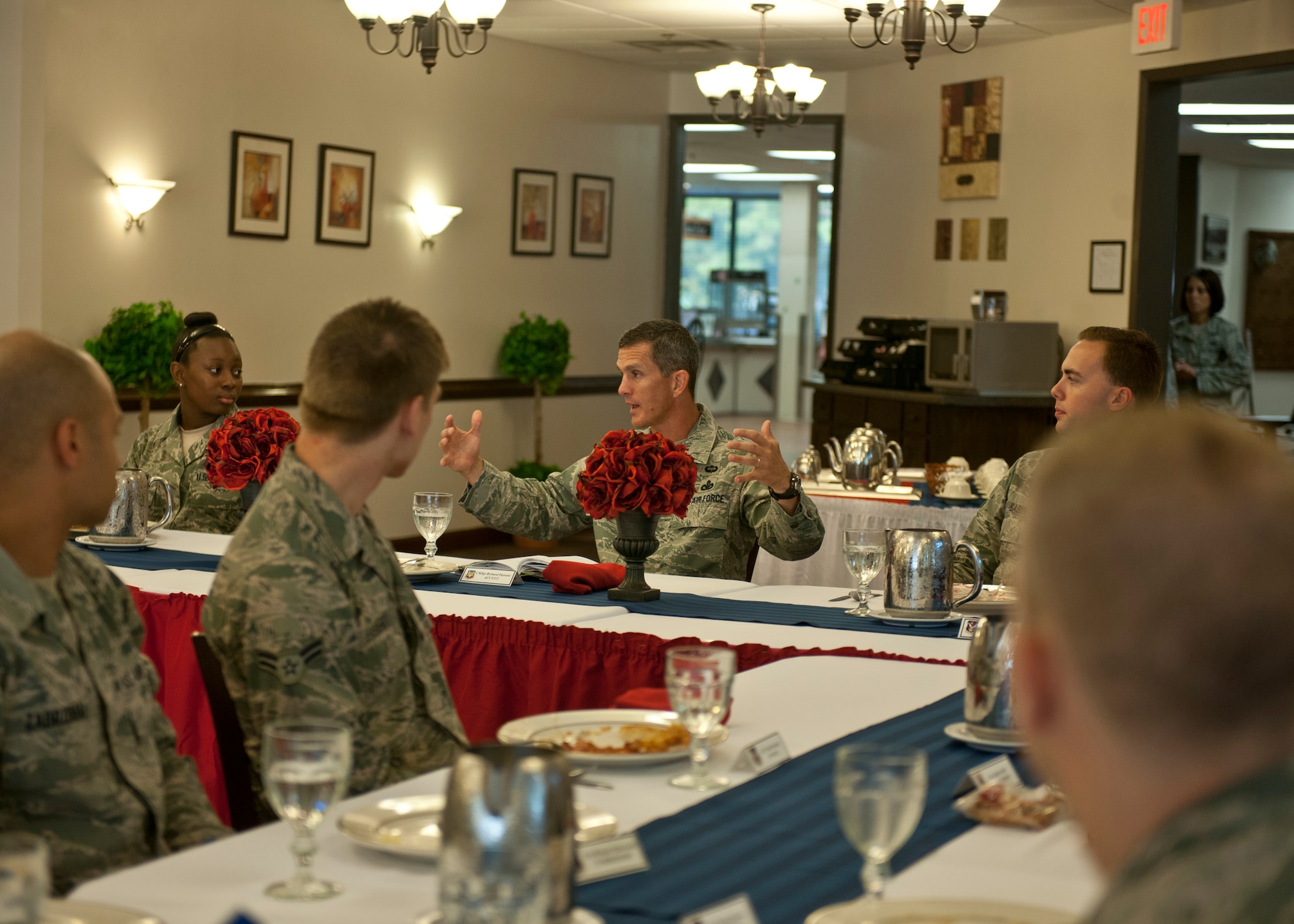 U.S. Air Force Chief Master Sgt. Rick Parsons, command chief of Air Combat Command, speaks with Airmen during breakfast at the Georgia Pines Dining Facility Aug. 1, 2012, at Moody Air Force Base, Ga. Parsons met with the Airmen to discuss some of the Air Force’s goals for the next few years and to answer any questions they had. (U.S. Air Force photo by Senior Airman Eileen Meier/Released) 