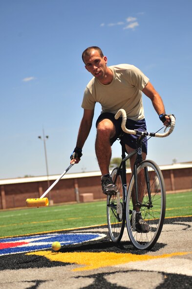 U.S Air Force 1st Lt. Alexander Pappalardo, 524th Special Operations Squadron mission co-pilot, poses on his bicycle at Cannon Air Force Base, N.M., Aug. 1, 2012. Pappalardo is a member of the Clovis, N.M. bike polo club. (U.S. Air Force photo/Airman 1st Class Eboni Reece)
