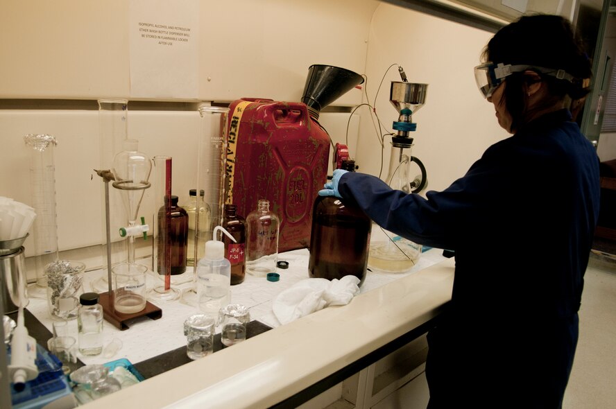 Dana Vuong, U.S. Naval Supply Fleet Logistic Center Pearl Harbor fuels department laboratory technician, sampling fuel during a bottle method test analysis July 27 to test for solids content in the fuel. The Airmen and Navy civilians operating the U.S. Naval Supply Fleet Logistic Center Pearl Harbor fuels department on Hickam Field pumped more than 10 million gallons of fuel to support air operations for RIMPAC. Twenty-two nations, more than 40 ships and submarines, more than 200 aircraft and 25,000 personnel are participating in RIMPAC exercise from Jun. 29 to Aug. 3, in and around the Hawaiian Islands. The world's largest international maritime exercise, RIMPAC provides a unique training opportunity that helps participants foster and sustain the cooperative relationships that are critical to ensuring the safety of sea lanes and security on the world's oceans. RIMPAC 2012 is the 23rd exercise in the series that began in 1971. (U.S. Air Force photo/Staff Sgt. Mike Meares)