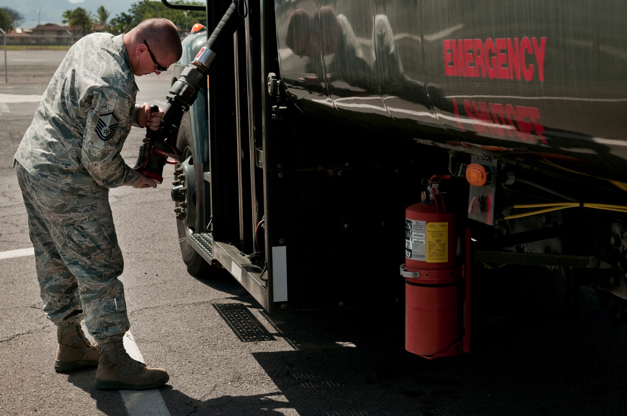 Master Sgt. Tony Karpenko, U.S. Naval Supply Fleet Logistic Center Pearl Harbor fuels department quality control inspector on Hickam Field, inspects a single point nozzle spot operational check July 25 for preventative maintenance. The Airmen operating the U.S. Naval Supply Fleet Logistic Center Pearl Harbor fuels department on Hickam Field pumped more than 10 million gallons of fuel to support air operations for RIMPAC. Twenty-two nations, more than 40 ships and submarines, more than 200 aircraft and 25,000 personnel are participating in RIMPAC exercise from Jun. 29 to Aug. 3, in and around the Hawaiian Islands. The world's largest international maritime exercise, RIMPAC provides a unique training opportunity that helps participants foster and sustain the cooperative relationships that are critical to ensuring the safety of sea lanes and security on the world's oceans. RIMPAC 2012 is the 23rd exercise in the series that began in 1971. (U.S. Air Force photo/Staff Sgt. Mike Meares)