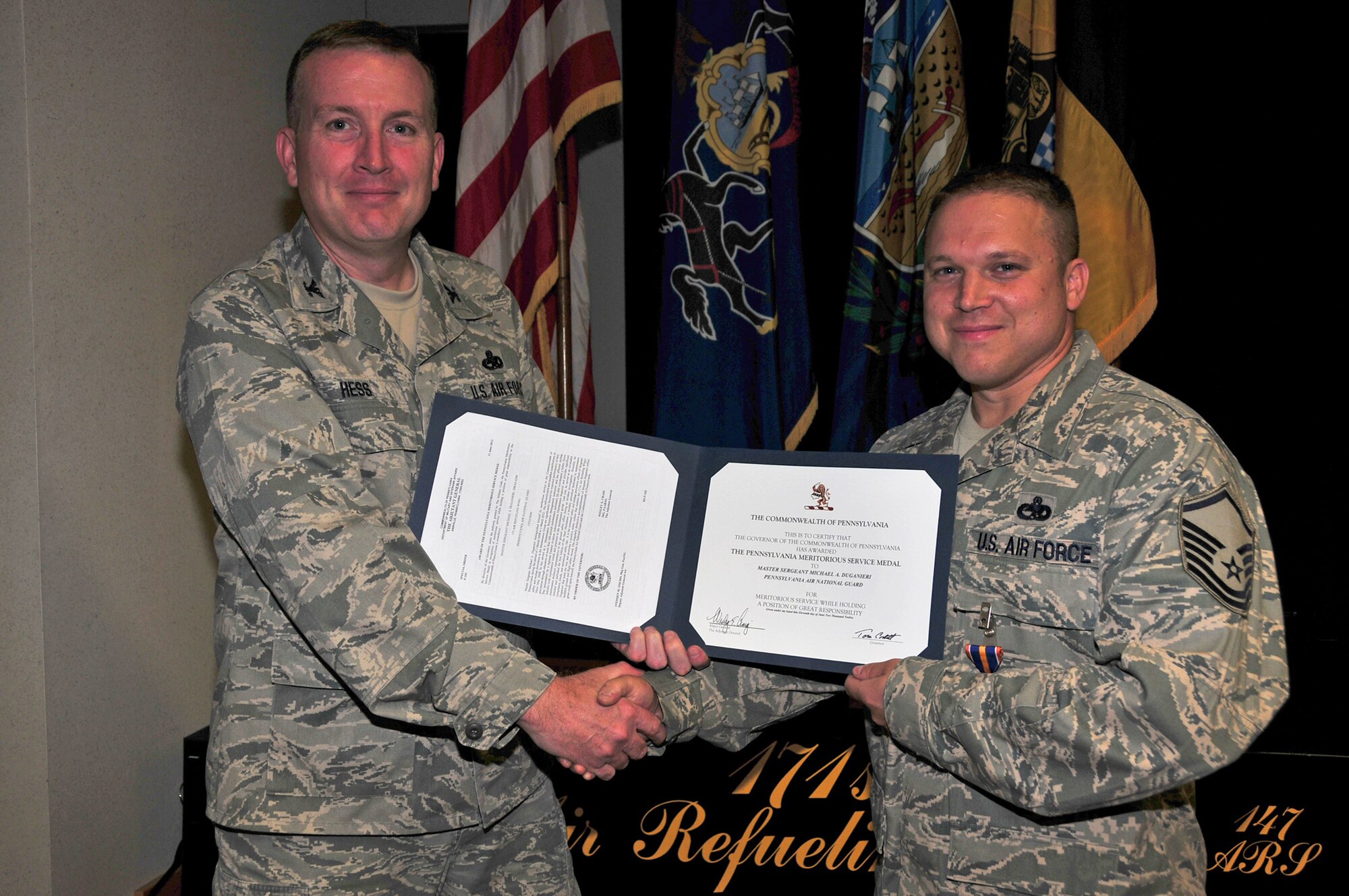 The 171st Air Refueling Wing recognizes Master Sgt. Mike Duganieri's contributions to safety and mishap prevention with a Pennsylvania Meritorious Service Medal August 3.  (National Guard photo by Master Sgt. Ann Young/ Released)