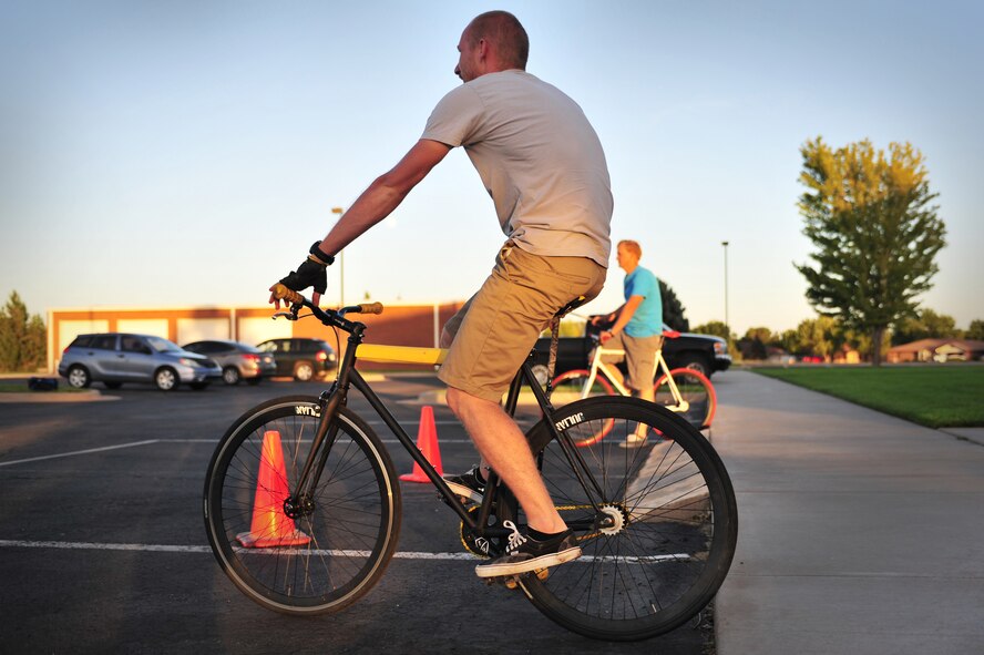 Matthew Loewen, town local, lines his bike up behind his team goal-line in Clovis, N.M., July 31, 2012. U.S. Air Force 1st Lt. Alex Pappalardo, 524th Special Operations Squadron, and several friends get together regularly to participate in bicycle polo recreationally. (U.S. Air Force photo/Airman 1st Class Alexxis Pons Abascal)