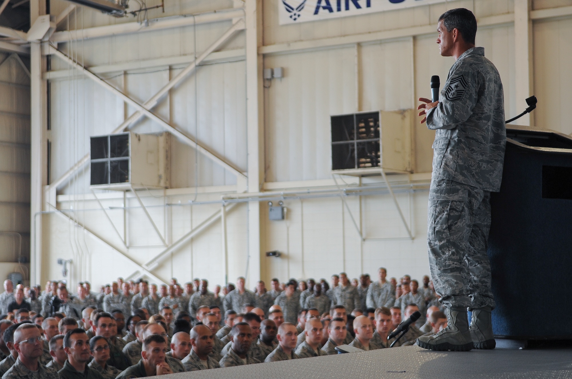 U.S. Air Force Chief Master Sgt. Rick Parsons, command chief of Air Combat Command, addresses Airmen at Moody Air Force Base, Ga., during an all-call Aug. 2, 2012. Parsons was the command chief of the 23d Wing from June 2009 to December 2010. (U.S. Air Force photo by Airman 1st Class Olivia Dominique/Released)