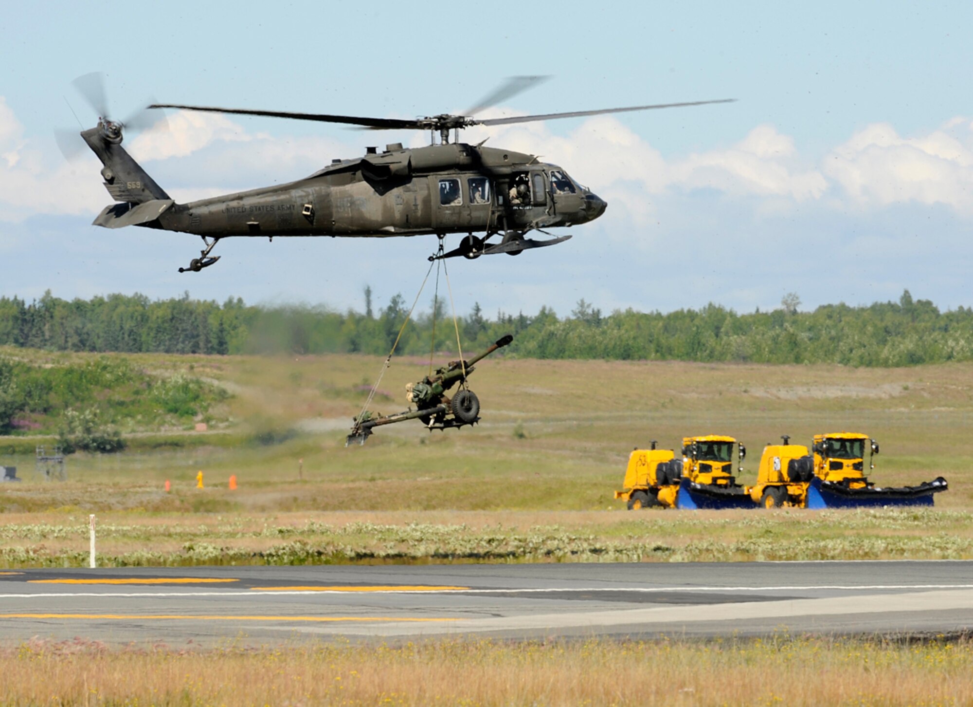 Visitors from around Alaska attended Joint Base Elmendorf-Richardson to enjoy the performances and displays available during the biennial Arctic Thunder Open House 2012 July 28-29. The events included an all-star lineup, featuring the U.S. Air Force's Thunderbirds F-16 Flight Demonstration Team, the U.S. Army's Golden Knights Parachute Team and many other civilian and military performers. This award-winning show displayed Army and Air Force equipment our deployed warriors use to defend our nation. (U.S. Air Force photo/Staff Sgt. Zachary Wolf)