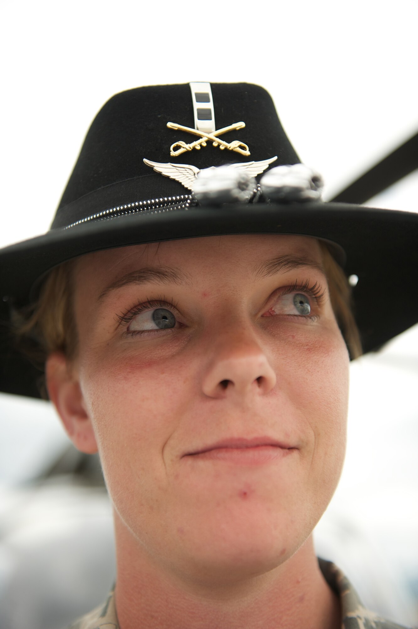 JOINT BASE ELMENDORF-RICHARDSON, Alaska -- Chief Warrant Officer 2 Adrienne Anderson, OH-58D Kiowa pilot of 6th Squadron, 17th Cavalry Regiment, Fort Wainwright, Alaska, sports a smart Cavalry Stetson July 28 during the Arctic Thunder 2012 Open House here. (U.S. Air Force photo/David Bedard)