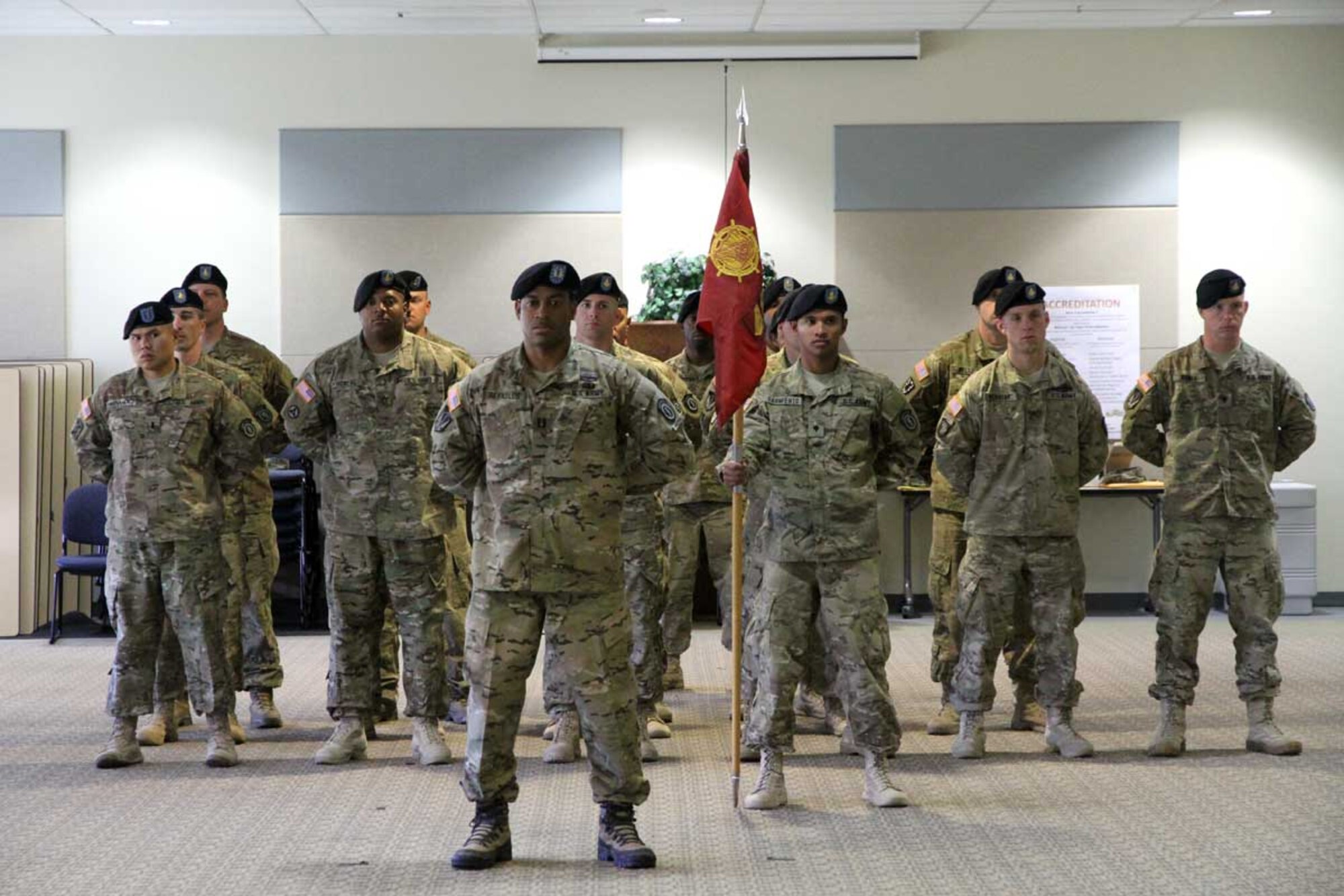 Soldiers of the 486th Movement Control Team stand at parade rest during the unit’s redeployment ceremony at the Richardson Education Center Tuesday. (U.S. Army photo/Sgt. Tamika Dillard)

