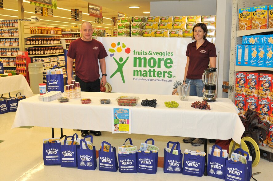 Mr. Robert Pagenkopf, 325th Aerospace Medicine Squadron exercise physiologist, and Ms. Michelle Gautreaux, 325th AMDS Dietician, educate commissary customers on healthy eating. (U.S. Air Force photo by Lisa Norman)