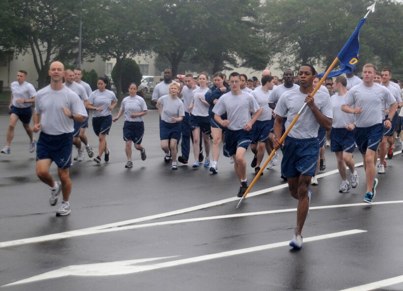 Airmen from the 35th Operations Group lead a monthly readiness run at Misawa Air Base, Japan, Aug. 3, 2012. This month’s run was hosted by the 35 OG and was held to promote fitness and raise espirit de corps throughout the base. (U.S. Air Force photo by Airman 1st Class Zachary Kee/Released)