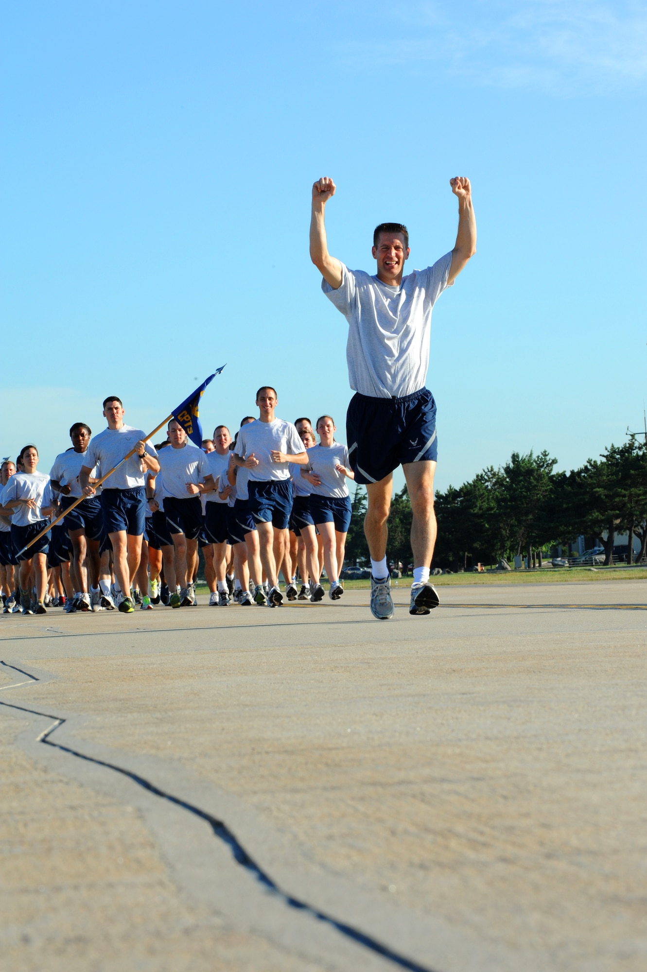 Col. Douglas Nikolai, 8th Fighter Wing vice commander, leads the 8 FW Warrior Run on Kunsan Air Base, Republic of Korea, August 3, 2012. This is the first Warrior Run for the newest group of Wing and Group leadership at Kunsan AB. (U.S. Air Force photo/Staff Sgt. Jonathan Fowler)