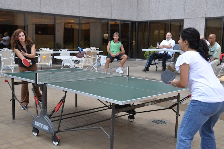 Corps vs. Corps lined up as the women took the table on July 31. Perennial finalist and 2006 champion Rosa Ramirez, programs and project management division lost a hard fought battle to Roxanne Vidaurre (in white), engineering division.
