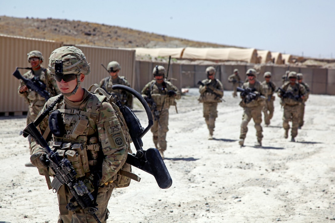 U.S. soldiers leave Combat Outpost Giro in Afghanistan's Ghazni province, July 23, 2012. The soldiers are assigned to the 82nd Airborne Division's 3rd Squadron, 73rd Cavalry Regiment, 1st Brigade Combat Team.