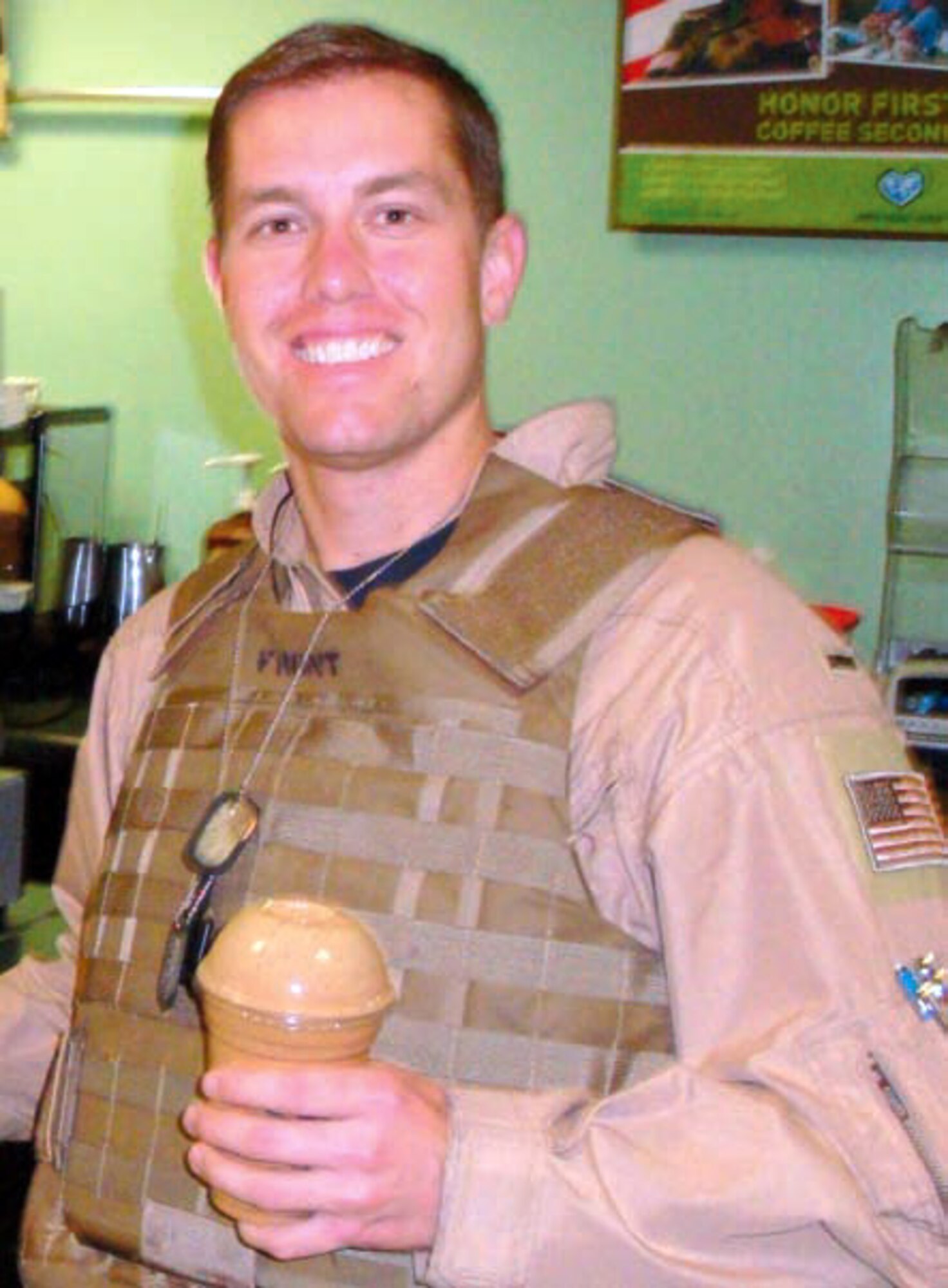 1st Lt. Jeremy Shields, pilot, 729th Airlift Squadron, March Air Reserve Base, Calif., takes a quick coffee break to reflect on the events that changed his life and the lives of two families, May 5, 2012. Shields and fellow crewmembers were on their way to dinner, after a transit mission to Germany, when they witnessed an auto collision involving a local mother with infant and another family. The March crew immediately rushed into action, applying basic first aid to the victims and securing the scene before emergency responders arrived. Thankfully, there were no fatalities during this unpleasant incident. (U.S. Air Force photo)