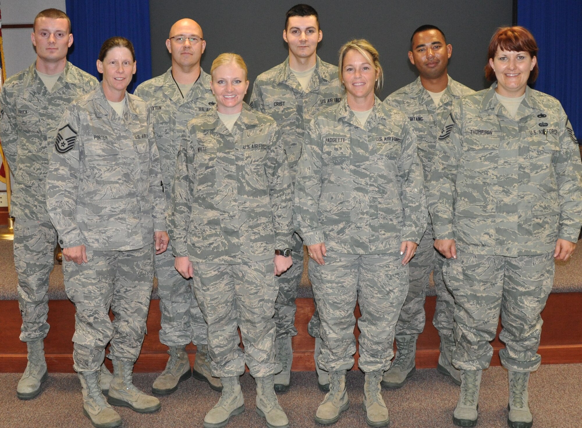 The 931st Air Refueling Group welcomed eight newcomers to the unit during the August unit training assembly.  Back row, left to right: Airman 1st Class Justin Fruck, Tech. Sgt.  Adam Buxton, Staff Sgt. Chris Chist, Senior Airman Brian Magbitang, front row, left to right: Master Sgt. Gina Porter, Airman 1st Class Ashley White, Carrie Padgette and Master Sgt. Candi Thompson. (U.S. Air Force Photo by Staff Sgt. Carrie M. Peasinger)