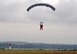 A pararescueman from the 308th Rescue Squadron comes in for a landing after a static-line jump over Comox, Canada, July 20, 2012. The jump was part of a training exercise with Royal Canadian Air Force search-and-rescue personnel stationed in Comox. (U.S. Air Force photo/Staff Sgt. Anna-Marie Wyant)