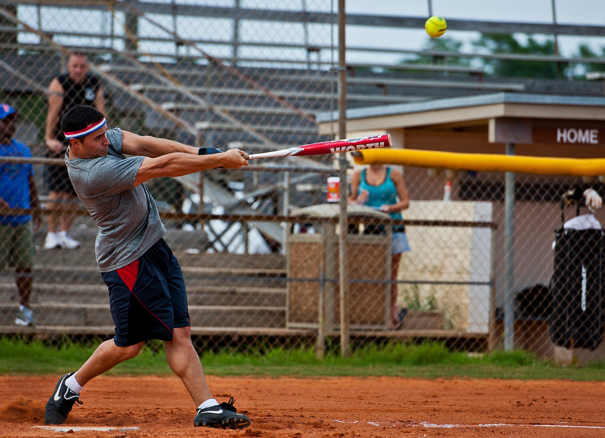 Armament Directorate’s Chay Derbigny swings for the fences during the intramural softball championship game Aug. 2 at Eglin Air Force Base, Fla.  MDG won the championship beating the Armament Directorate in final inning 7-6.  (U.S. Air Force photo/Samuel King Jr.)