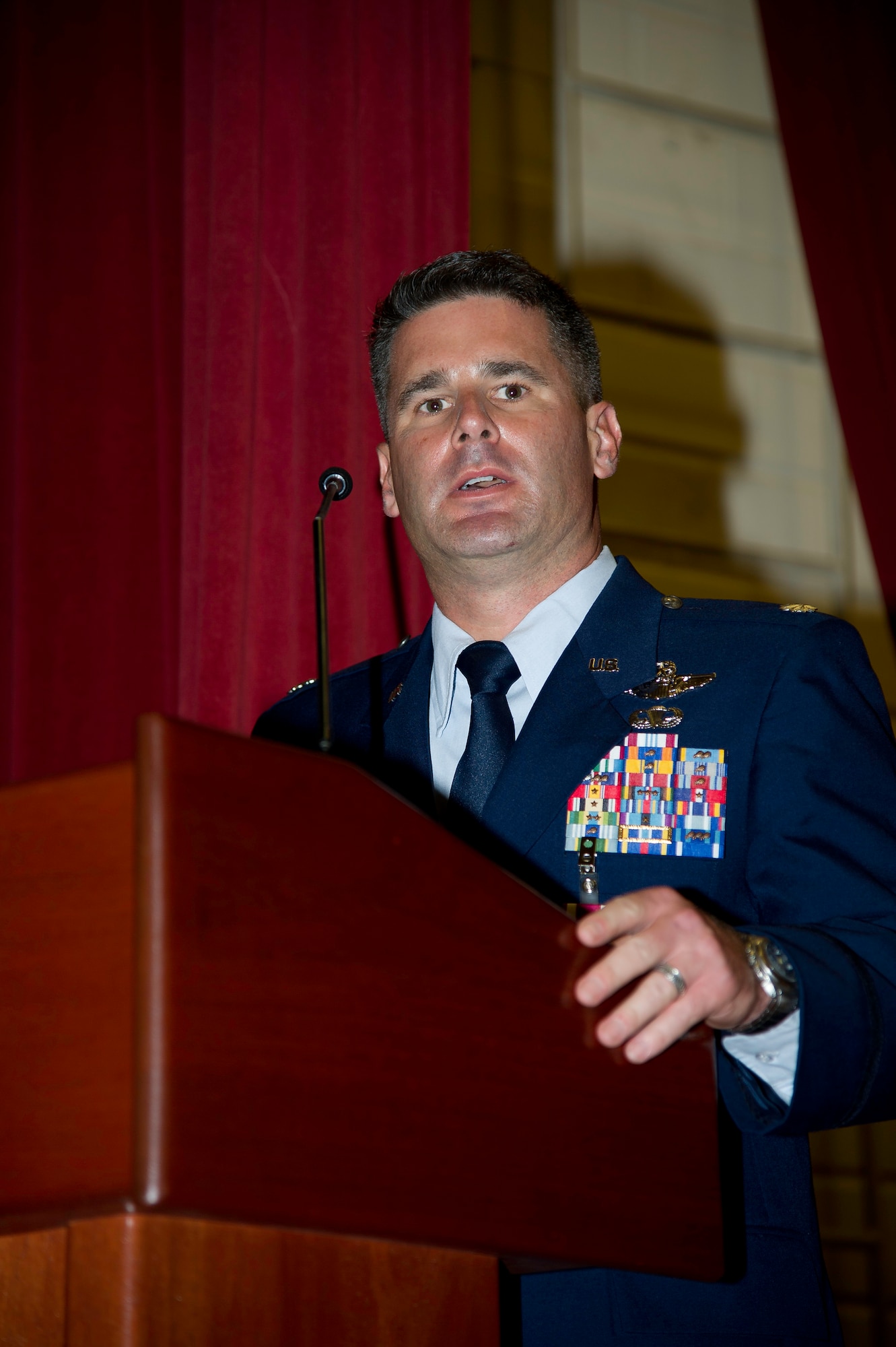 Lt. Col. Scott Minton, 912th Air Refueling Squadron incoming commander, takes command of the 912th ARS from Lt. Col. Brice Middleton, 912th ARS outgoing commander, July 21, during a change of command ceremony in the Cultural Resource Center. Col. Shawn Teagan, 92nd Operations Group commander, Fairchild AFB, Wash., presided over the event. Senior Master Sgt. Eric Butt, 912th ARS first sergeant, holds the guidon which symbolizes the transfer of authority from the old to the new commander. (U.S. Air Force photo by Staff Sgt. Matthew Smith) 